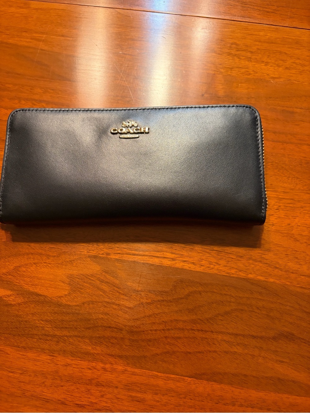 COACH Black Leather Zip Wallet with Gold Logo